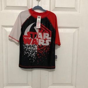 Gently worn swim top for little boys.